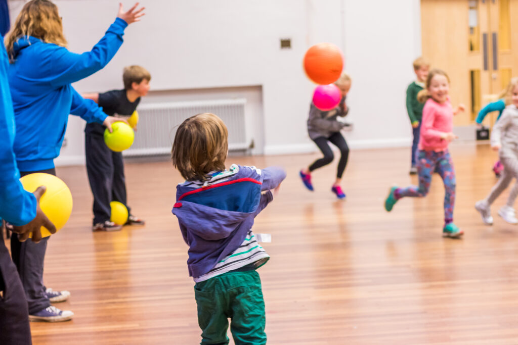 children having fun with ball