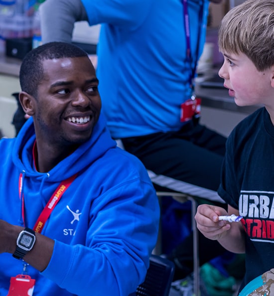 A man talking with a child