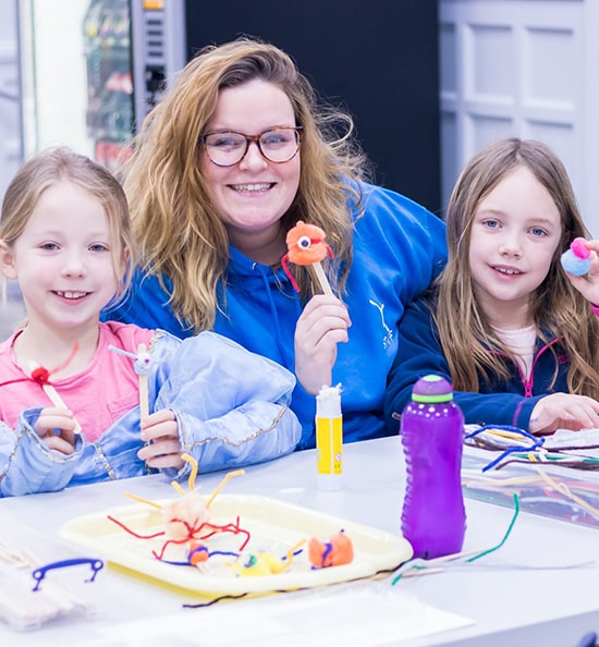 Oxford Active staff playing with children