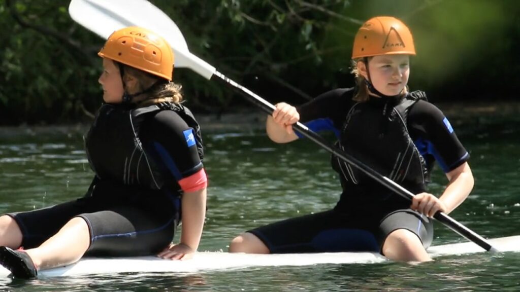 adventurers on kayak