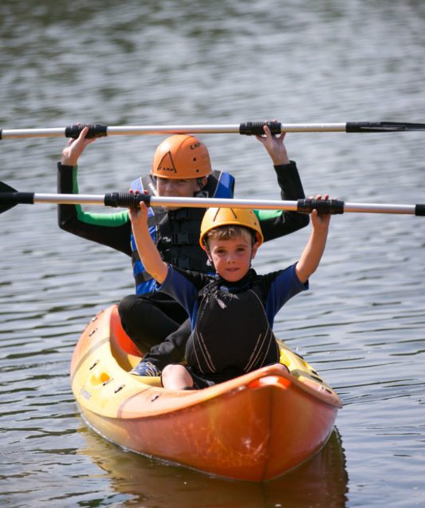 Boys on a kayak