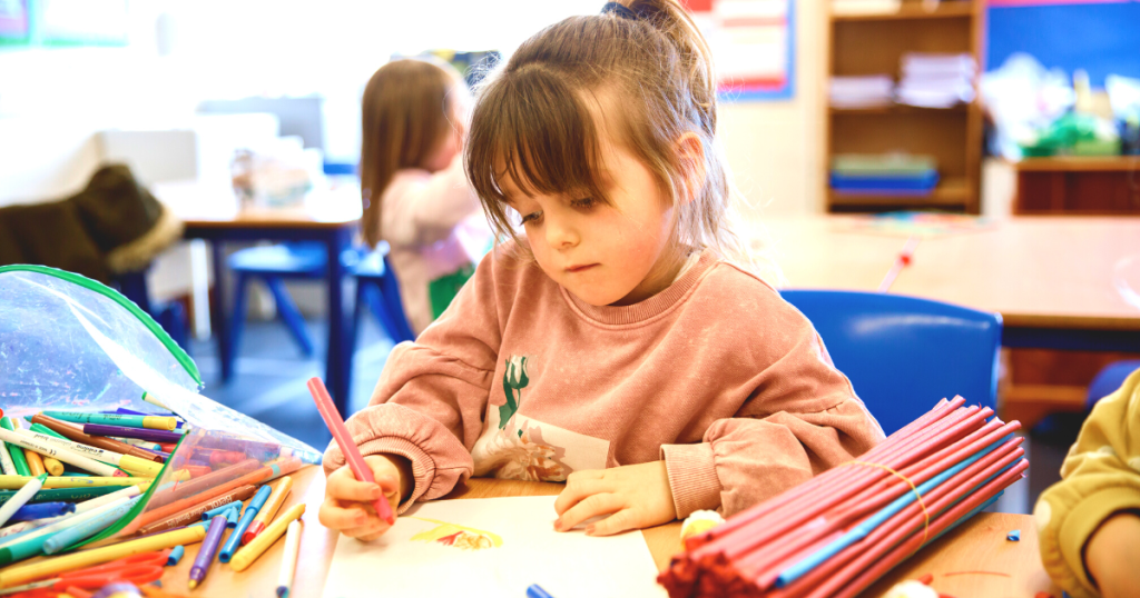 a girl drawing something