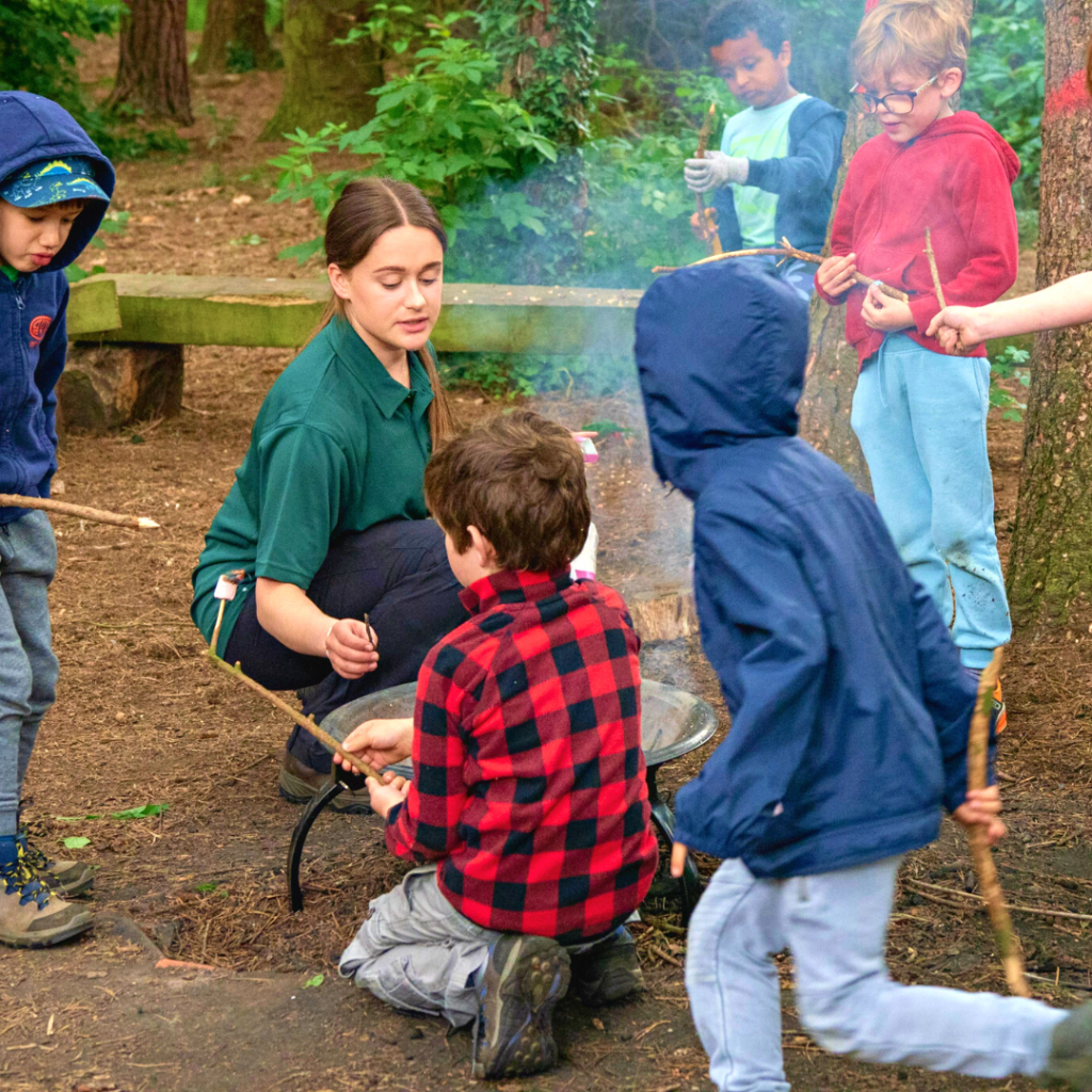 kids learning how to make fire