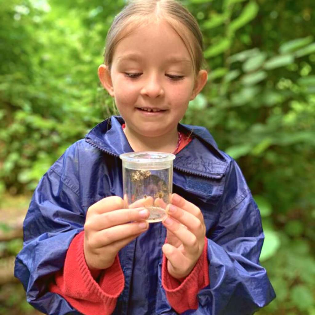 a girl holding something