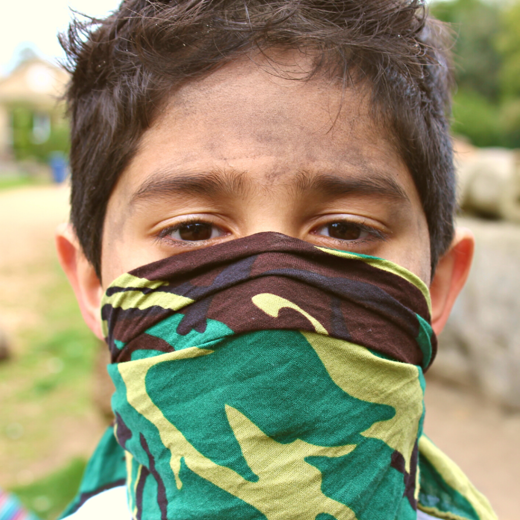 a kid wearing a face mask