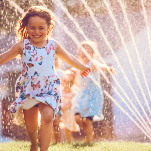 a girl playing with the water