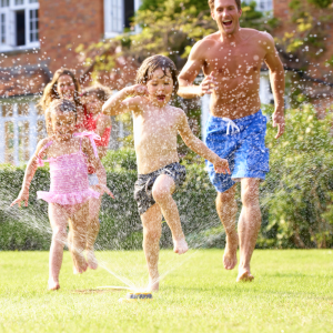 children playing sprinklers