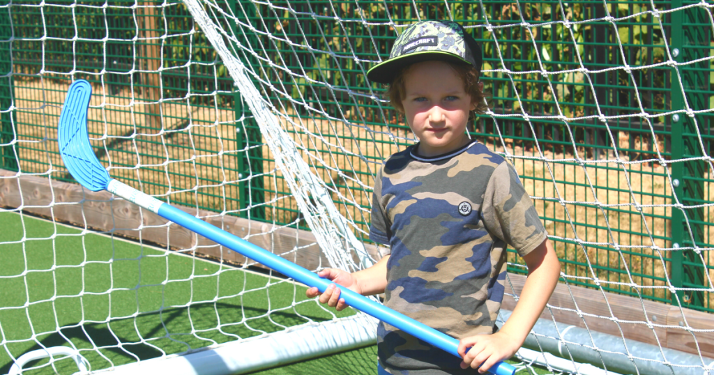 a kid playing hockey