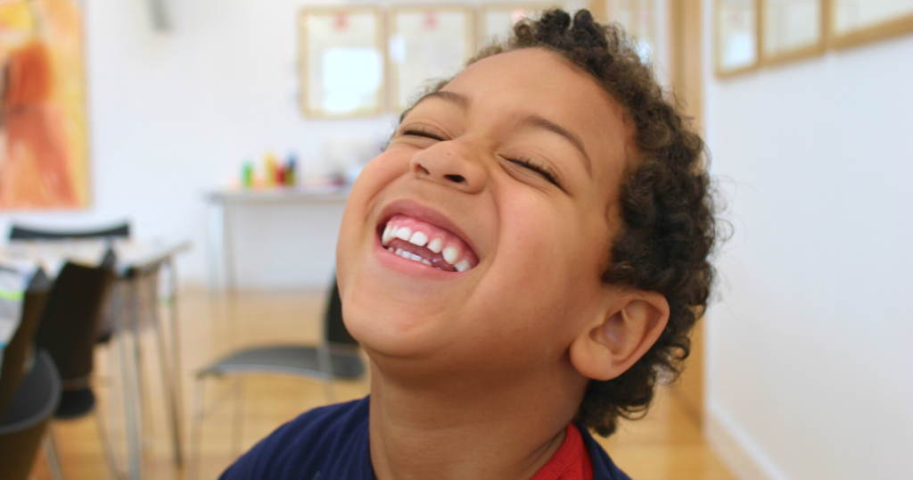 a boy smiling