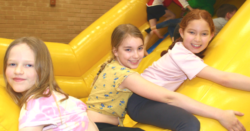 children playing on the slide