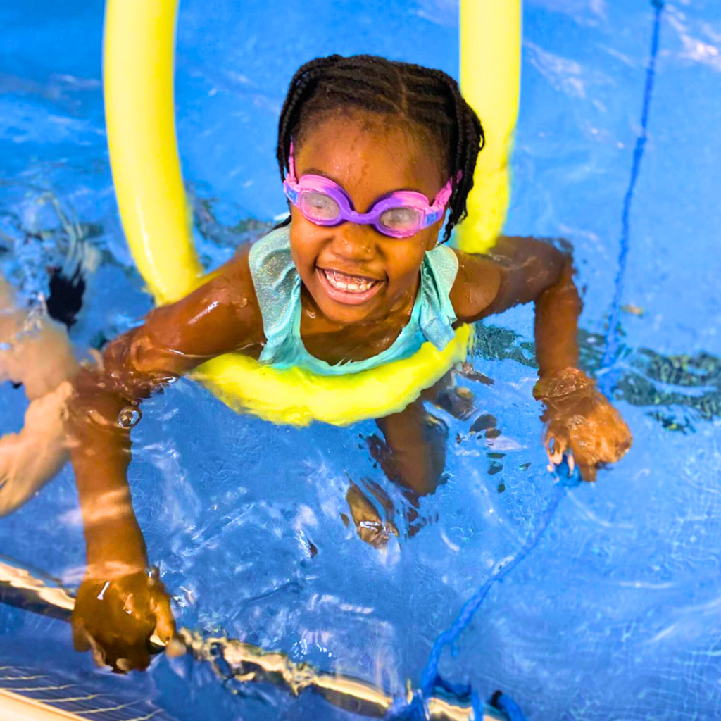 a beautiful girl swimming